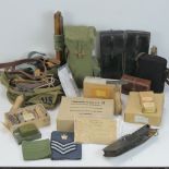 A quantity of Cold War German/US militaria, including rations, tent equipment and tools.