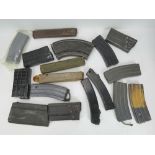 A quantity of machine gun magazines including; WWII Bren, WWII Thompson,M16 and HK G3.