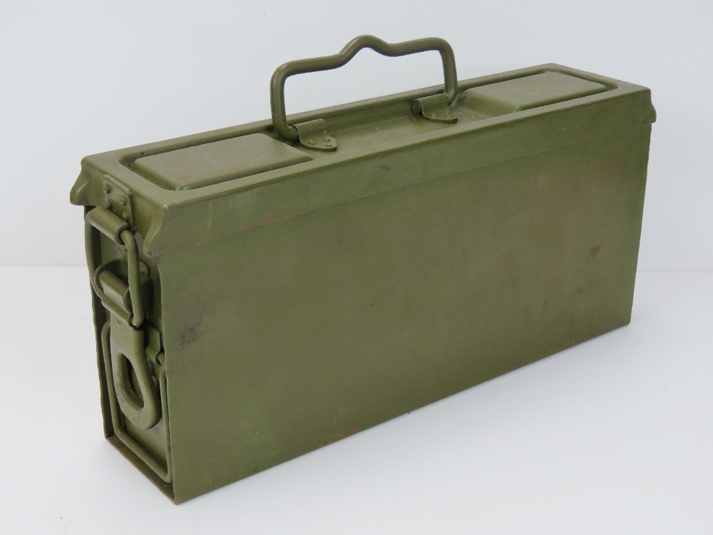 A WWII German MG34, MG42 early pattern ammunition can, dated 1943 and having double hinged lid,