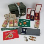 A British Military Cold War era two-man ration tin containing Cold War German/DDR medals and