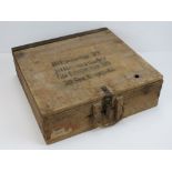 A WWII German Flak/Artillery fuse case, dated 1945 having stencilling and packing labels upon.