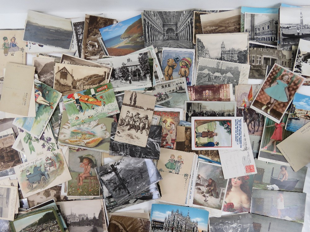 A quantity of loose 20th century vintage postcards including military, topographical,