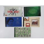 Five Royal Mail commemorative prestige stamp books; 'Football Heroes' in sealed packet,