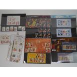 Four Royal Mail mint presentation pack stamps with matching stamp sets; 'Smilers', 'Christmas 2013',