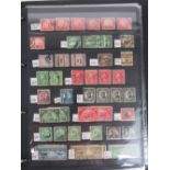 Stamps; a stuck down album of King George VI Australian stamps, a loose leaved album of USA stamps,