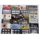 Thirteen Isle of Man Post Office mint presentation pack stamps including; 'Isle of Man TT',
