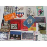 A quantity of assorted World stamps in presentation packs including; US, Isle of Man, Greenland,