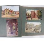 A collection of early 20th century vintage postcards contained within period album,