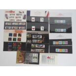 Seven Royal Mail mint presentation pack stamps with matching stamp sets; 'Definitive Stamps' (x2),