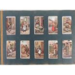 Four Wills cigarette card albums containing a collection of assorted cigarette cards by Willd,