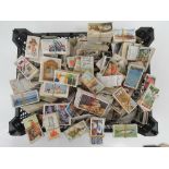 An extensive collection of loose cigarette cards, mostly in sets/part sets,
