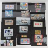 A quantity of Isle of Man Post Office stamp sets and part sets, in twenty-one mint sleeves,