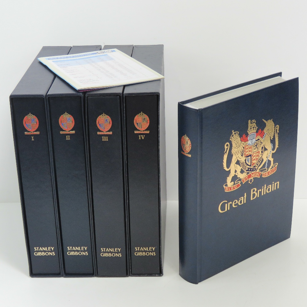 An unused Stanley Gibbons Great Britain loose leaf stamp album together with the matching set of