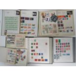 A collection of world stamps within four stock books and four stck down albums.