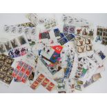 A quantity of assorted British stamps many having sheet margin attached, some pre decimalisation,