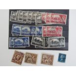 A quantity of loose used stamps to include George VI brown £1,