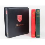 A unused Stanley Gibbons 'Alderney I' album with sleeve,