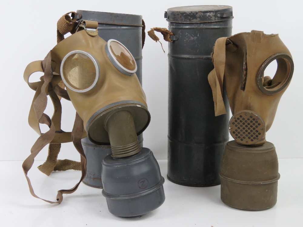 Two WWII Axis Military Issue gas masks,