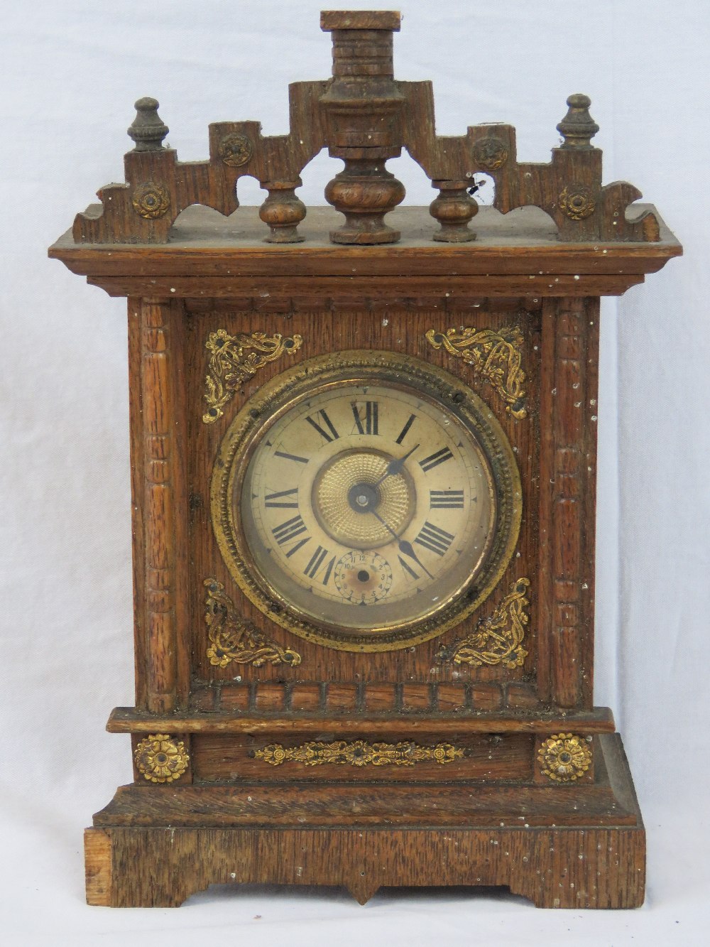 A Continental Viennese style table clock having Arabic numerals,