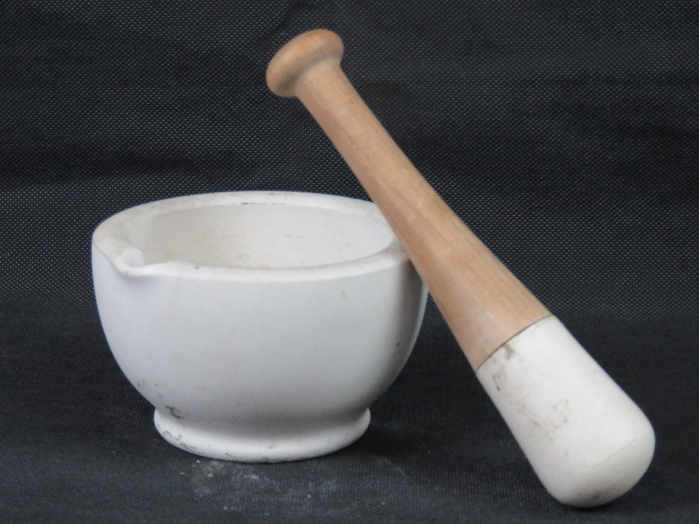 An alabaster mortar and pestle, 13cm dia. - Image 2 of 2