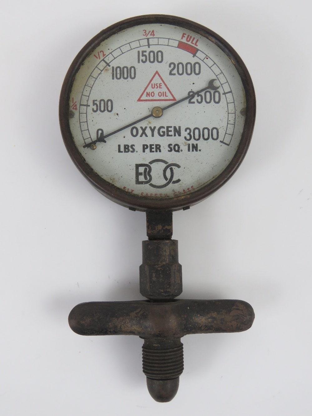 A brass oxygen safety gauge registering to 3000 LBS per Sq. In., 10cm dia.