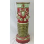 A Victorian majolica ware torchere stand decorated in reds and greens in relief, 79cm high, a/f.