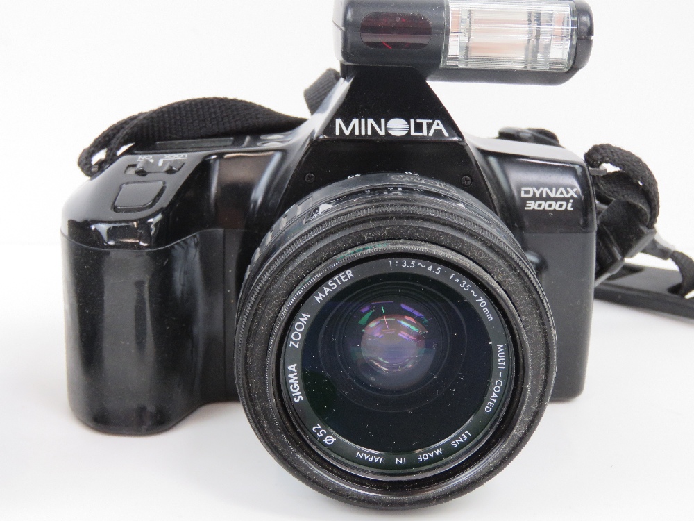 A Minolta Dinax 3000i 35mm SLR camera with a sigma 100-300mm zoom lens. - Image 2 of 3