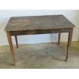 An early 20th century pine table raised over straight cut legs, replacement plywood top a/f,