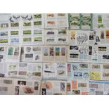 A quantity of Brooke Bond tea cards in booklets together with some by PG Tips,