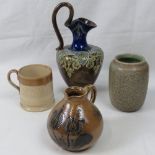 A Royal Doulton stoneware ewer in brown, blue and green glaze, 21cm high, a/f, a Royal Doulton vase,