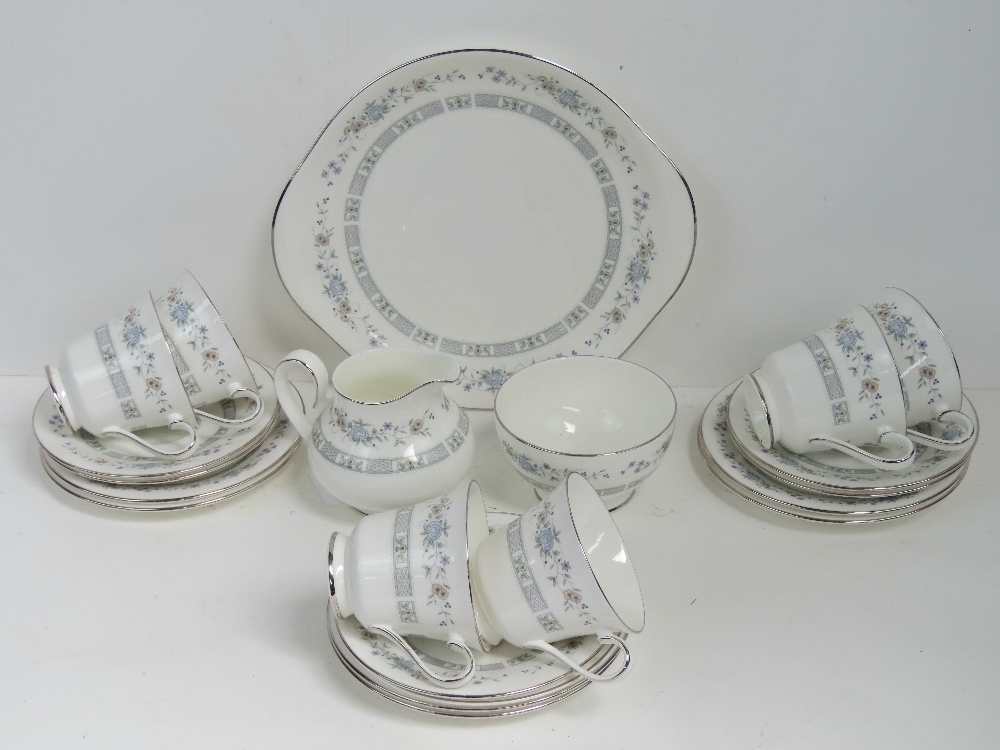 A quantity of Royal Doulton Tara tea ware comprising six trios, cake plate and sugar bowl.