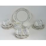 A quantity of Royal Doulton Tara tea ware comprising six trios, cake plate and sugar bowl.