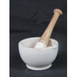 An alabaster mortar and pestle, 13cm dia.