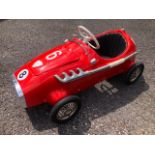 A rare Pines Monza pedal race car C1960s. Finely detailed plastic body measuring 108cm in length.