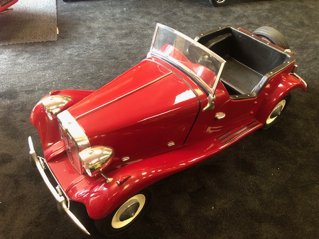 A Touchwood MG TD pedal car C1980s. Finely detailed fibreglass body measuring 126cm in length.