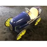 A Tri-ang Brooklands pedal car C1949s. Finely detailed metal body with horn.