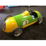 A Mazeratti pedal race car C1960s. Finely detailed metal body measuring 140cm in length.