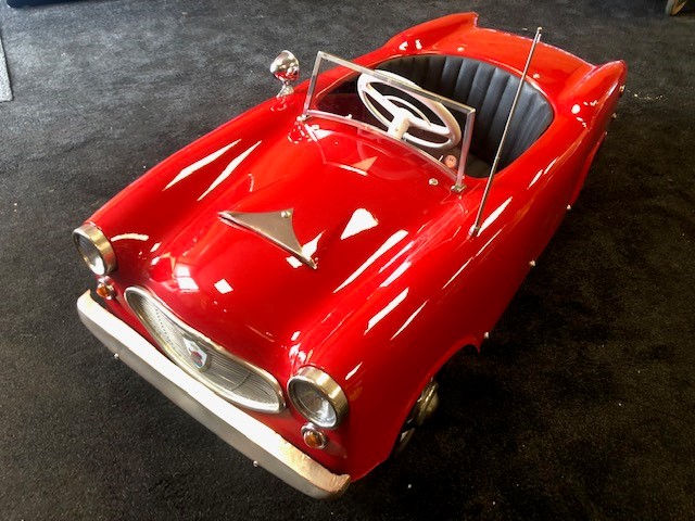 A rare Pines Alfa Romeo pedal car C1960s. Finely detailed plastic body measuring 127cm in length.