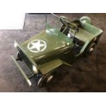 A Tri-ang American Jeep pedal car C1960s. Finely detailed metal body measuring 100cm in length.