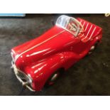 A Tri-ang Centurian pedal car C1950s. Finely detailed metal body complete with radio.