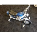 A Tri-ang Harley Davidson motorbike C1960s. Finely detailed plastic body measuring 90cm in length.