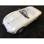 A Kefa E-Type Jaguar Pedal Car C1960s having highly detailed plastic body.