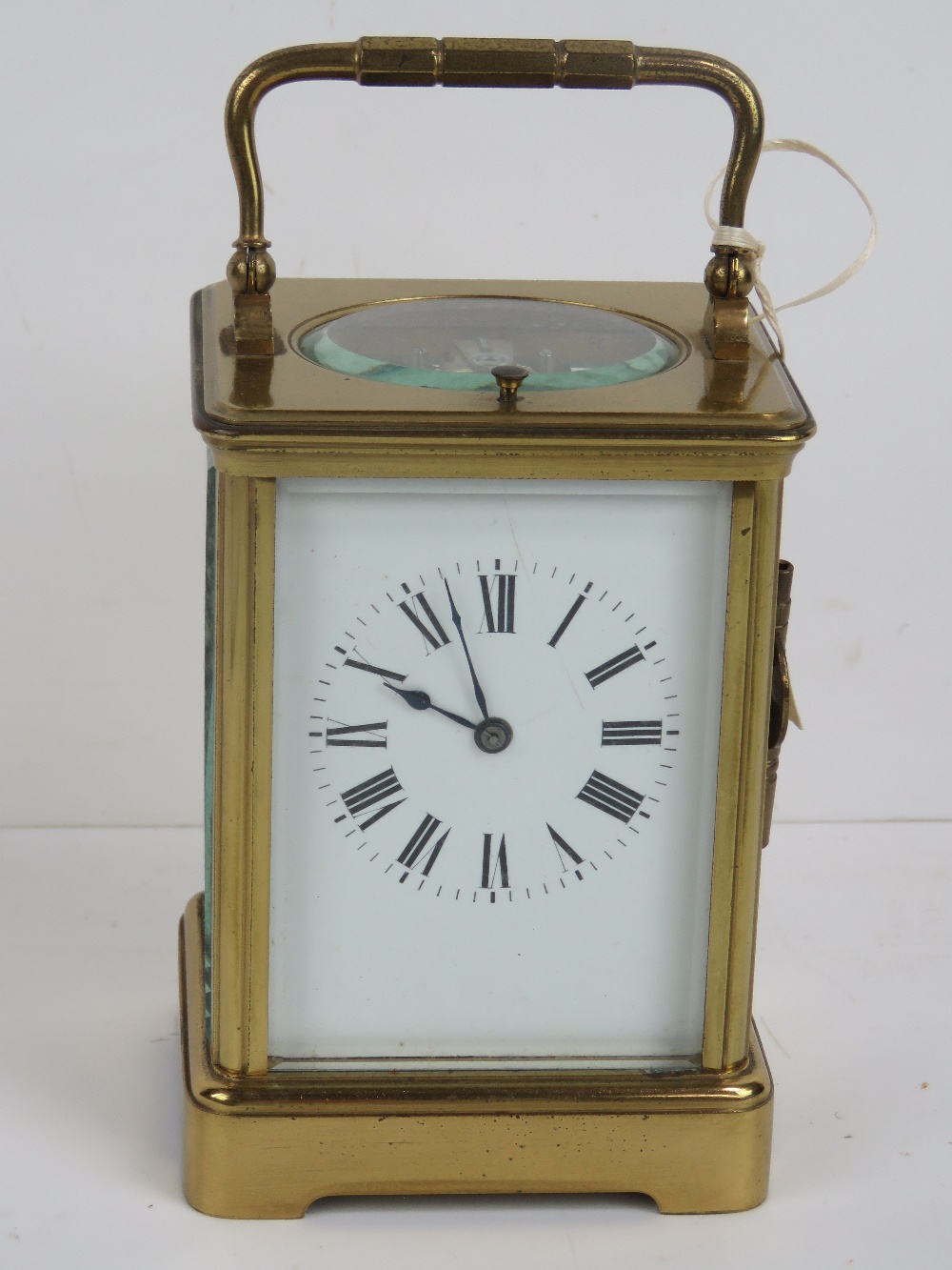 A five glass brass carriage clock having swing handle over,