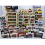 A large collection of scale model cars within original boxes by LLedo and Vanguards,