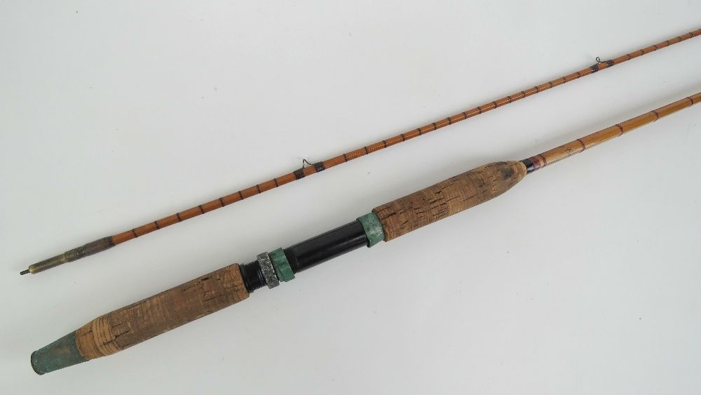 A vintage Allcocks two piece split cane fly fishing rod 'Lightcaster', 8ft long.