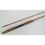 A vintage Allcocks two piece split cane fly fishing rod 'Lightcaster', 8ft long.