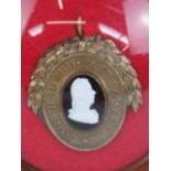 A silver gilt oval Pitt Club badge,