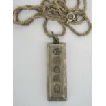 A HM silver ingot pendant on silver woven chain, total weight 1.34ozt.