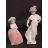 Two LLadro Nao figurines; girl in white dress standing 22cm high,