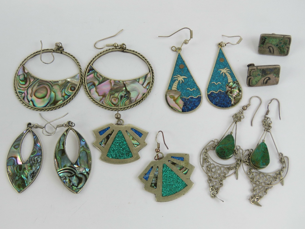 Four pairs of white metal and abalone shell earrings,